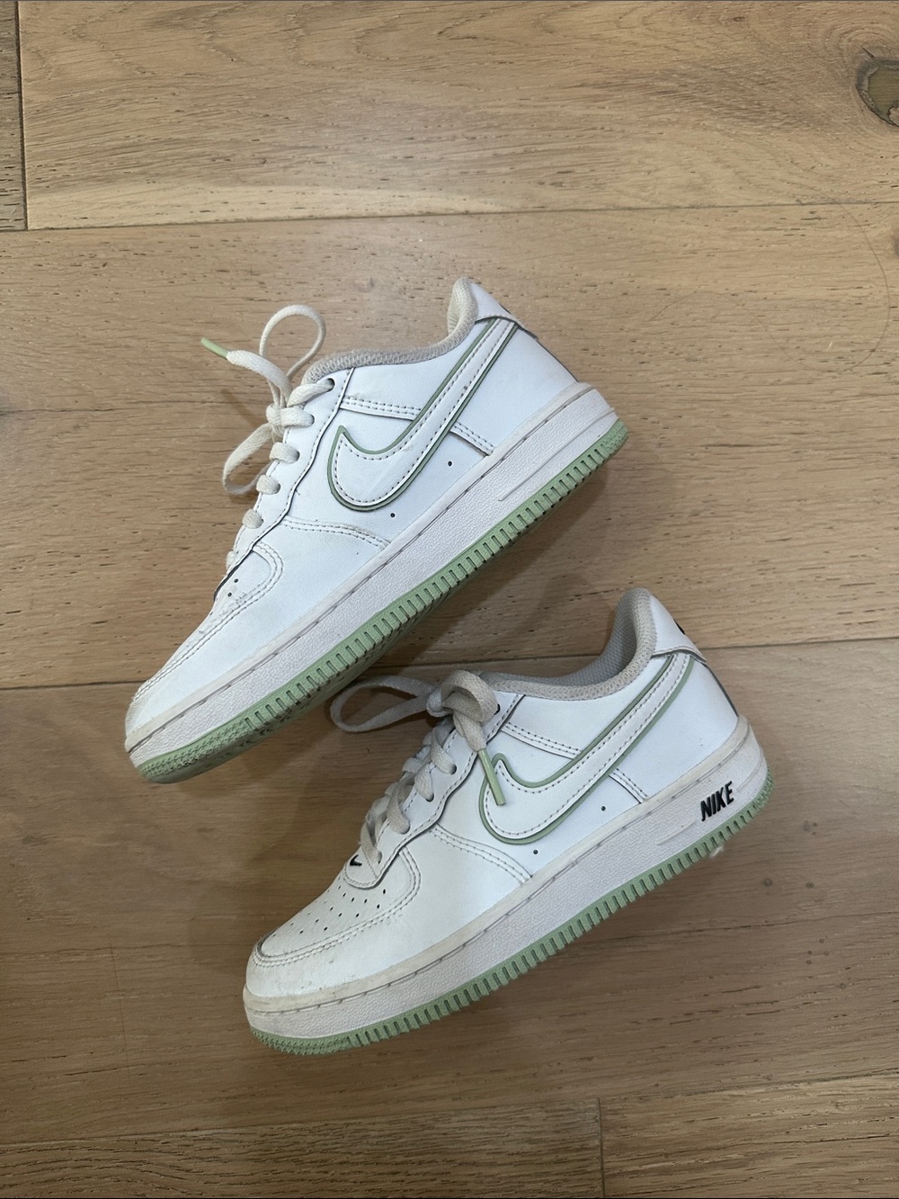 Nike Kids White Sneakers with Light Green Trim